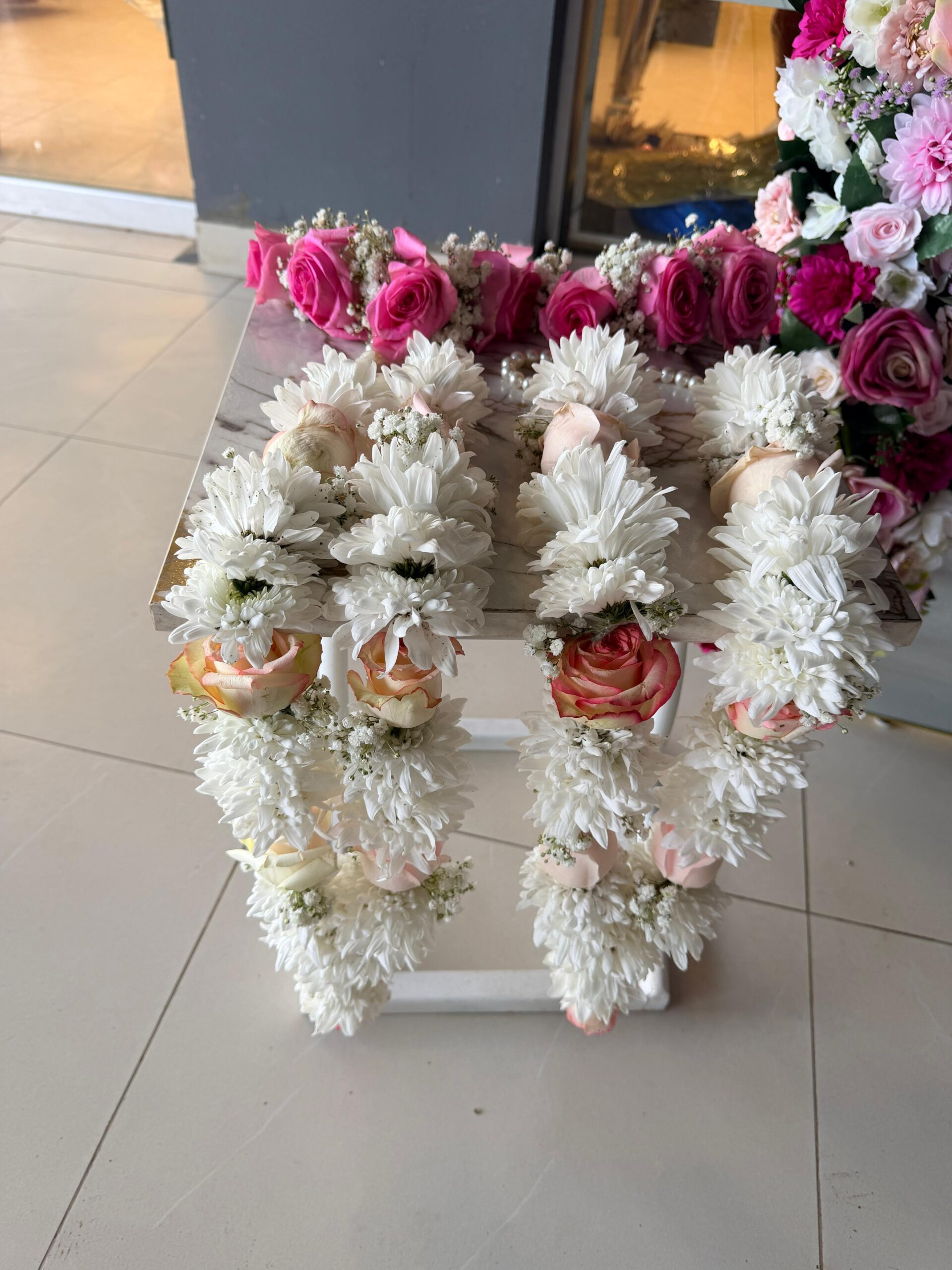 0fb6a9e0-49dd-440e-9d28-7f5a4dd41290 Elegant White & Pink Floral Garland Pair - Image 1