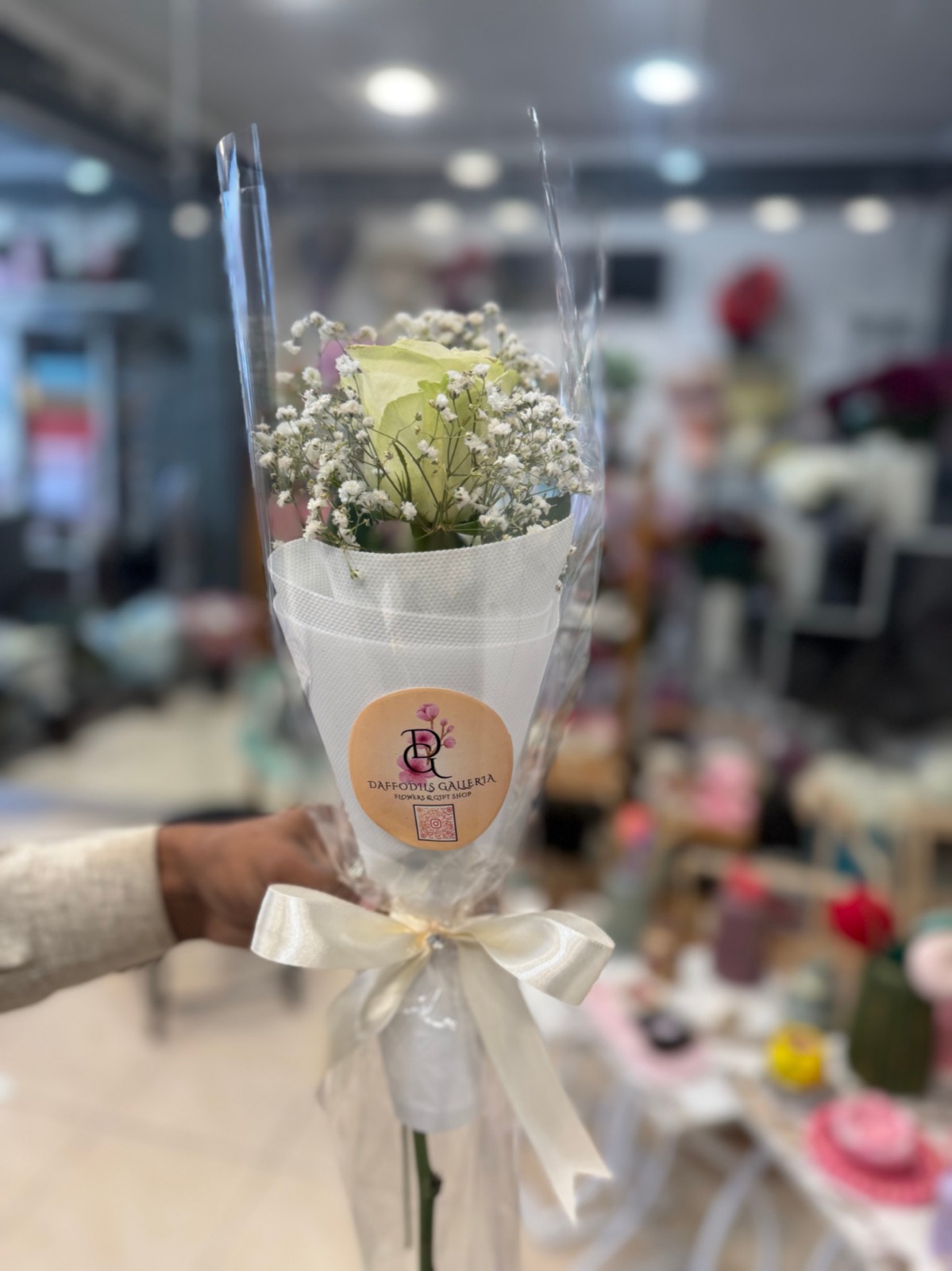 ade6a715-8e4a-4686-be61-80796d86e70f Single White Rose with Baby’s Breath Wrap - Image 1