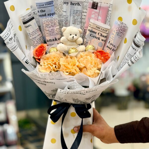 Peach Carnation & Teddy Bear Newsprint Bouquet