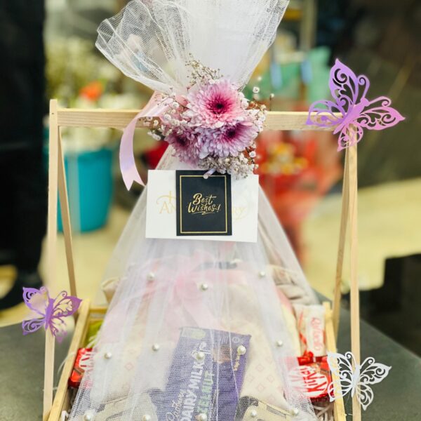 Elegant Floral & Treats Gift Basket with Pink Mums and Chocolates
