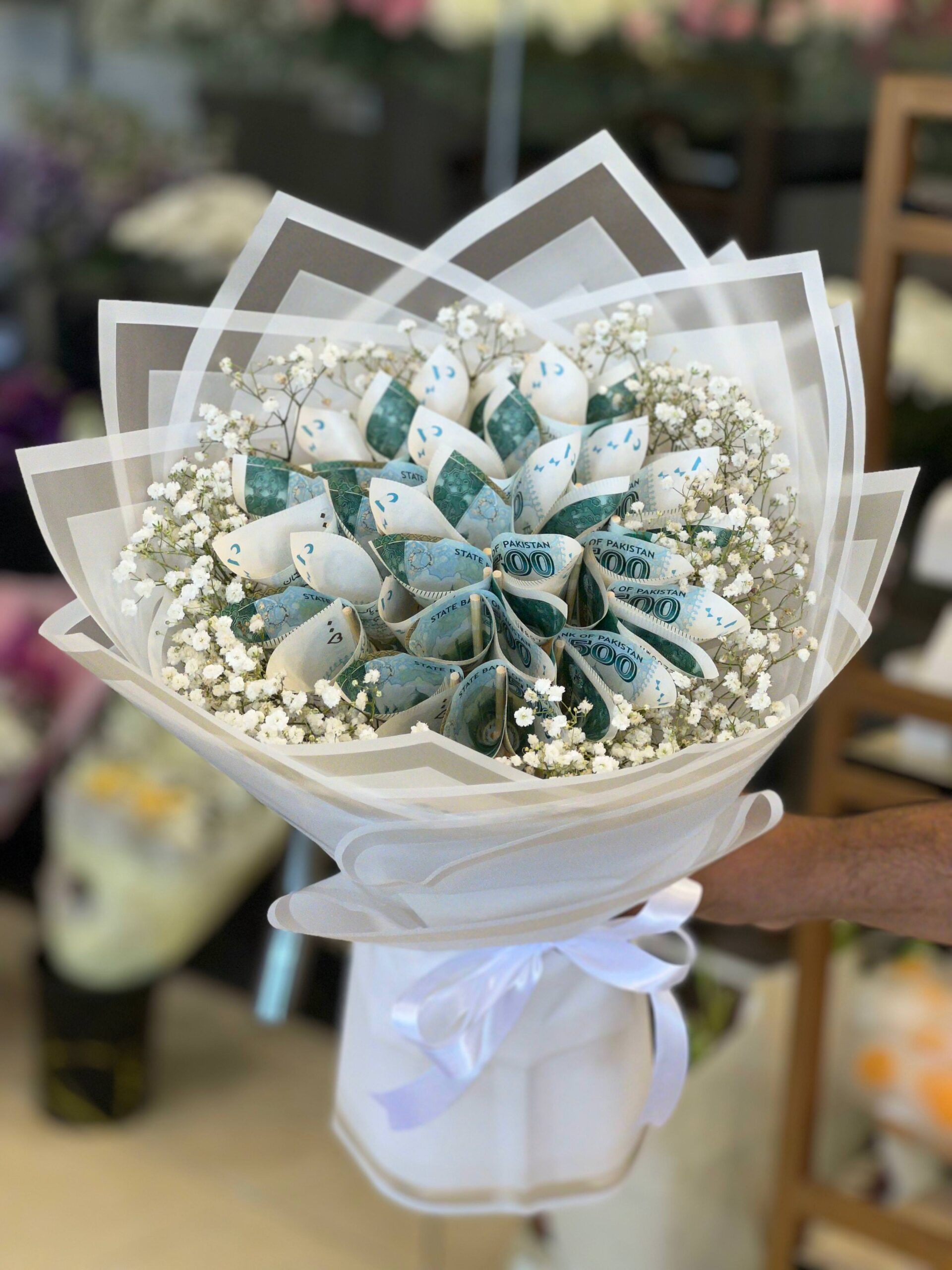 IMG_4997.JPG Elegant Cash Bouquet with Baby Breath in White Wrap - Image 1